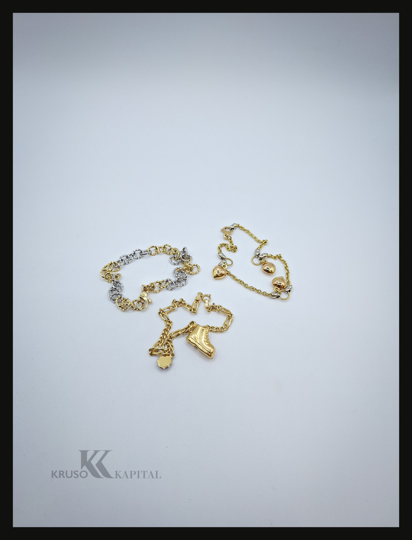 Tre braccialetti oro 