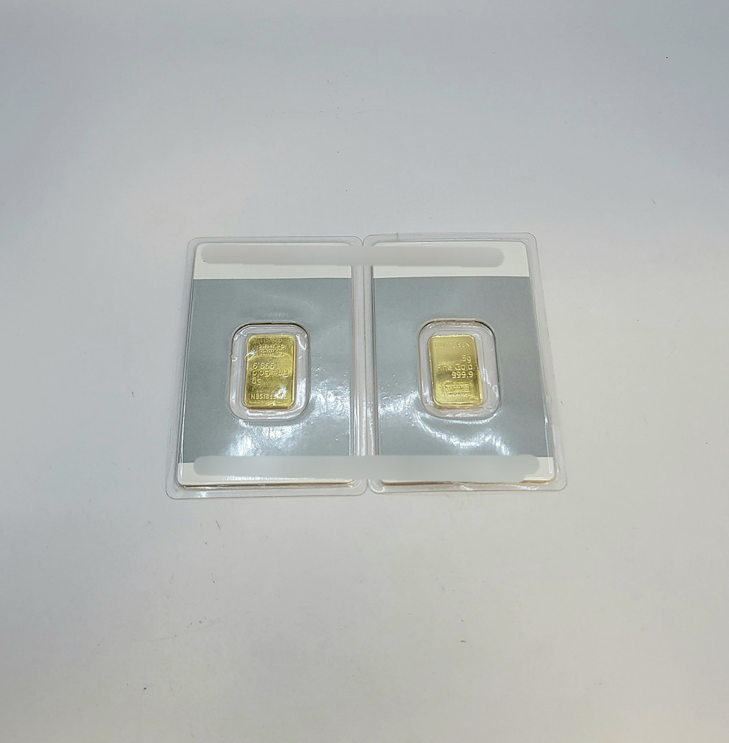 Due lingotti in oro 