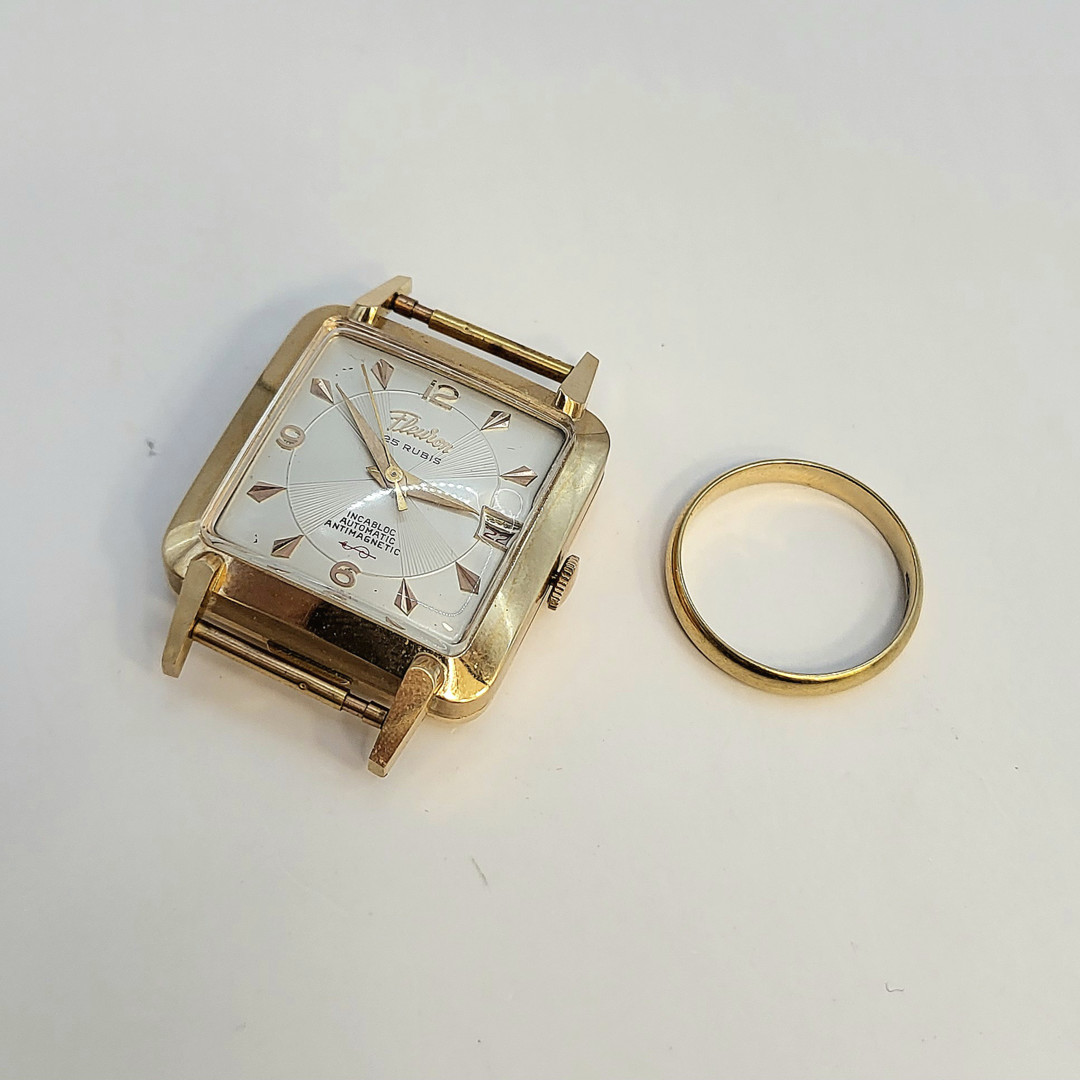 Anello e orologio oro