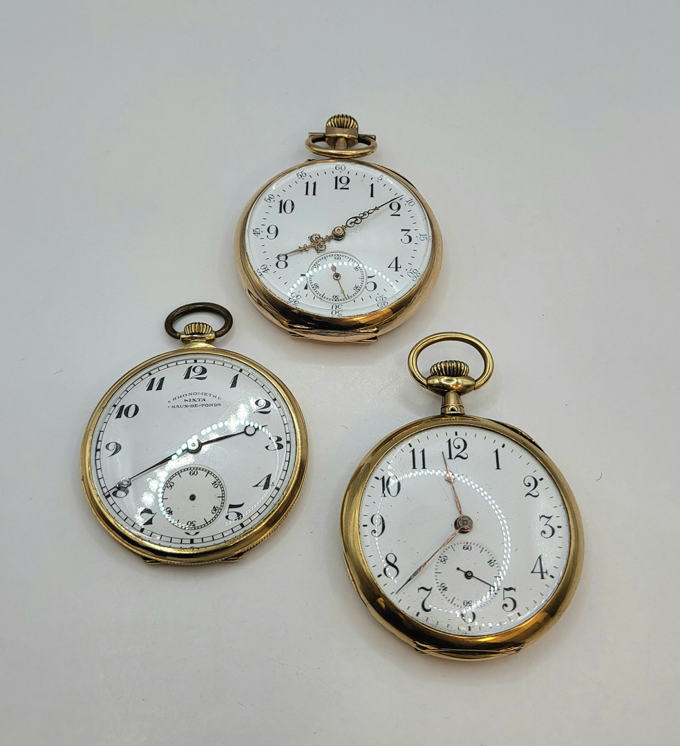 Tre orologi da tasca oro