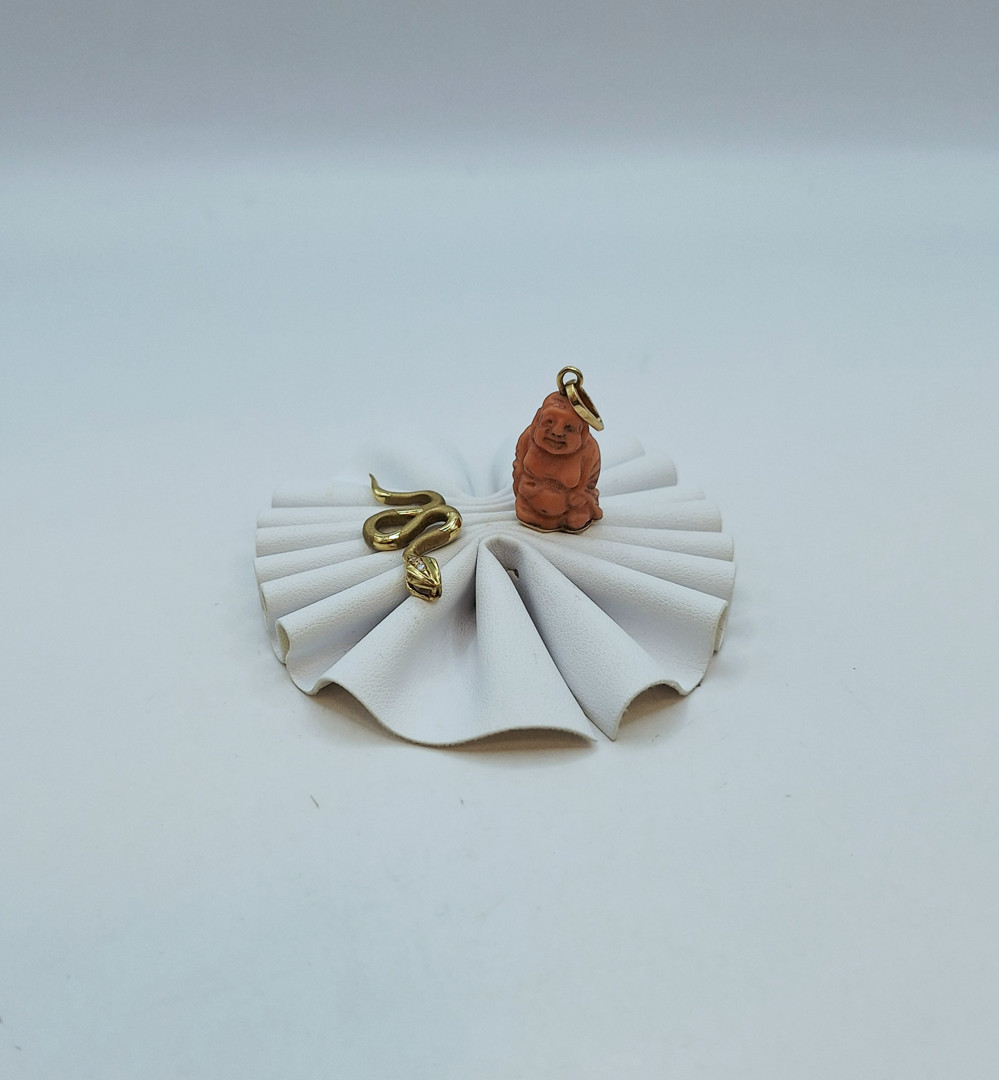 Due ciondoli oro pietre