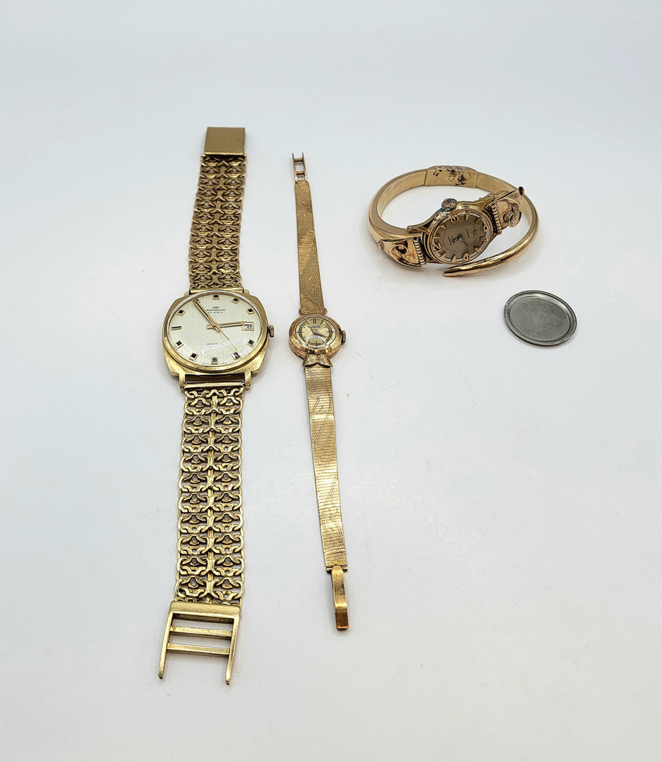 Tre orologi oro metallo 