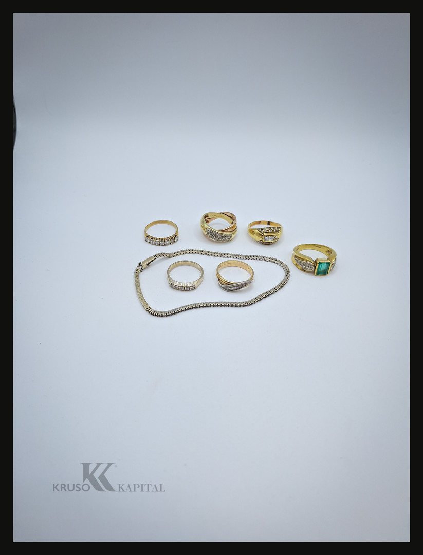 Sei anelli e bracciale oro diamanti pietre