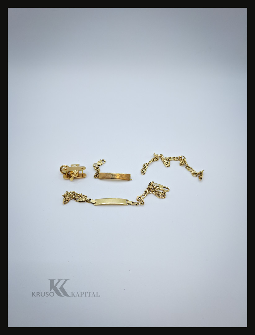 Due bracciali e ciondolo oro
