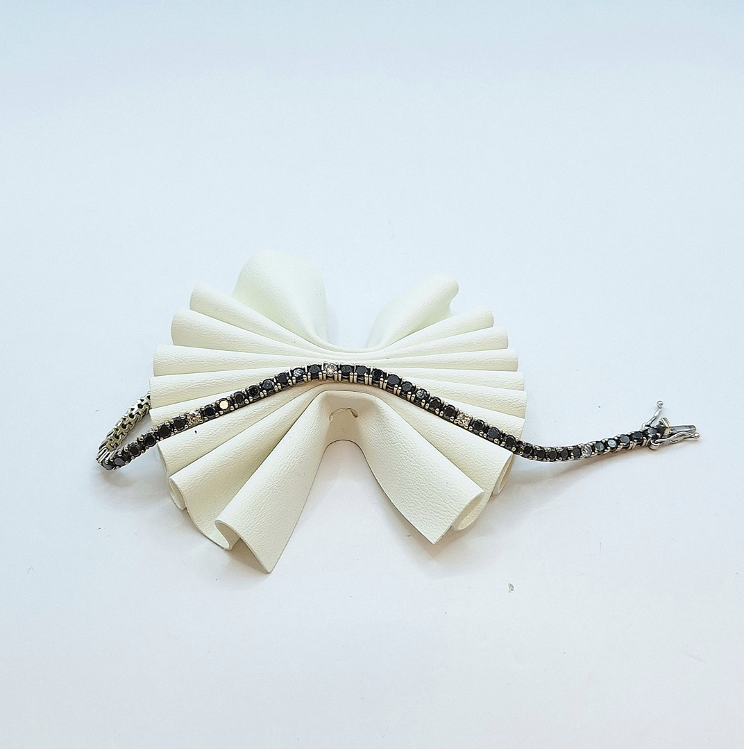 Bracciale tennis oro con diamanti bianchi e neri 