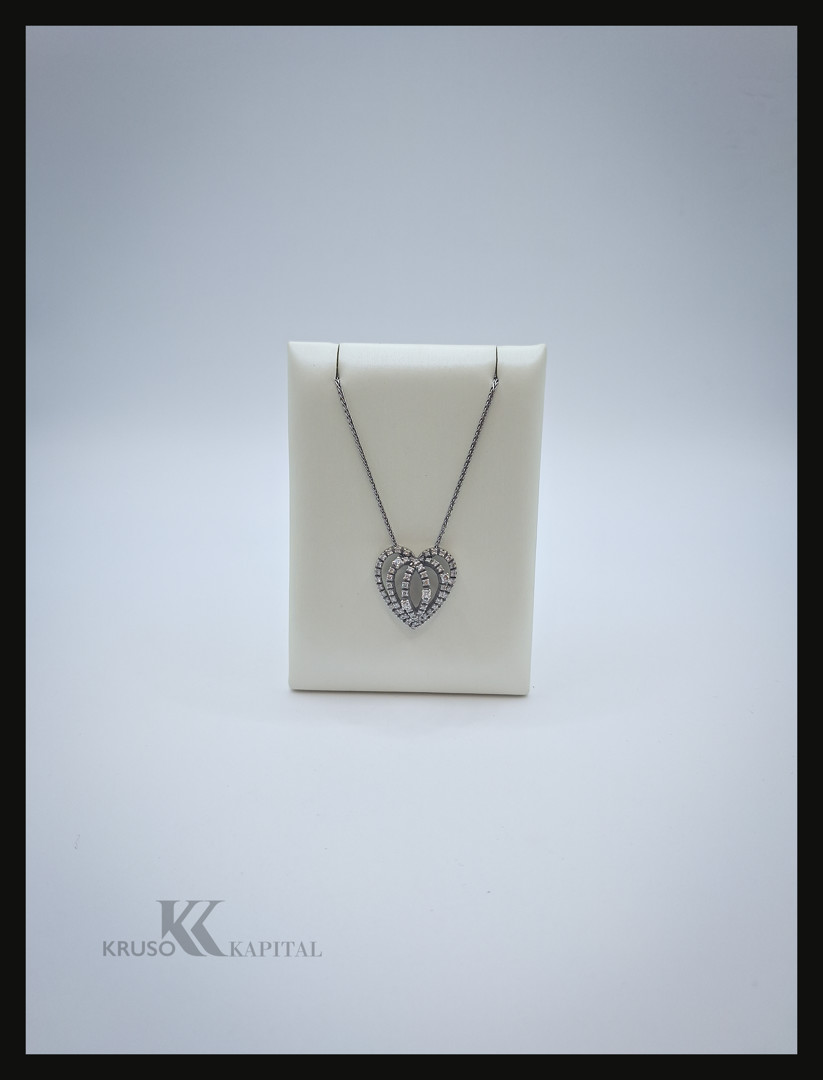 Collana e ciondolo a firma Damiani in oro con diamantini