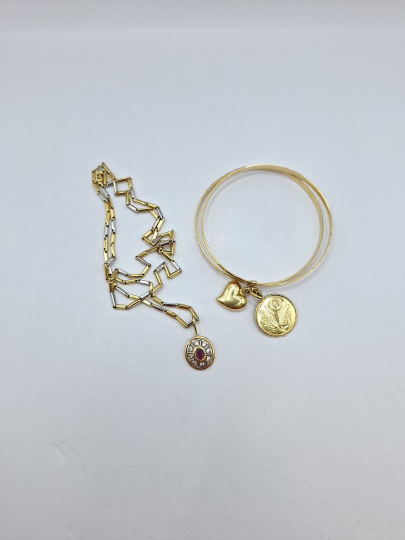 Bracciale collana e tre ciondoli in oro pietre