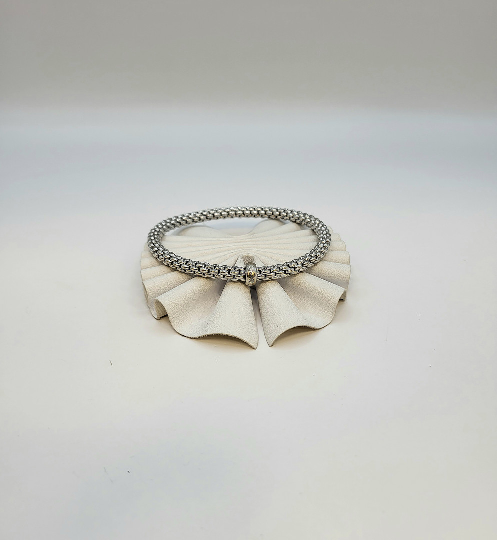 Bracciale a firma Fope oro diamantino