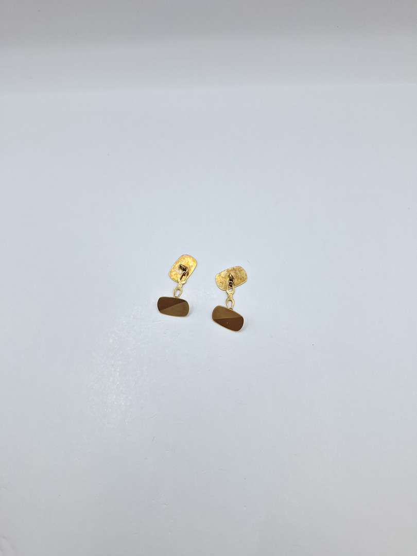 Un paio di gemelli in oro 