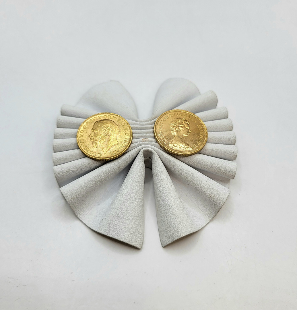 Due pezzi oro monetato