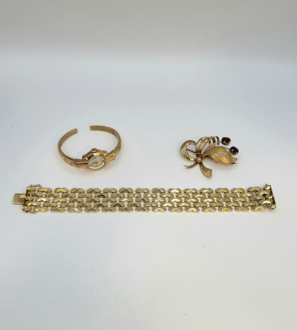 Bracciale spilla e orologio con bracciale oro pietre