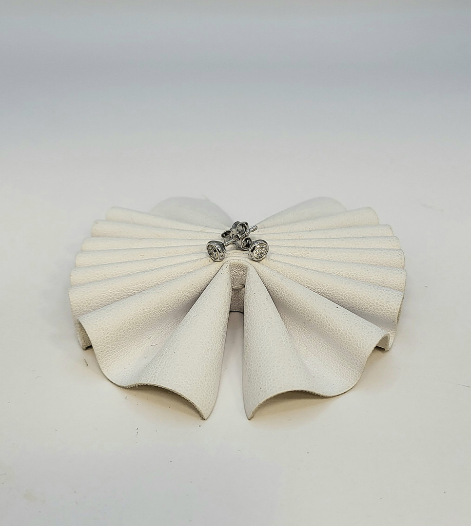 Paio orecchini oro diamantini