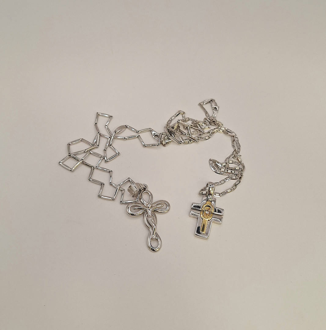 Quattro collane e quattro croci oro pietre