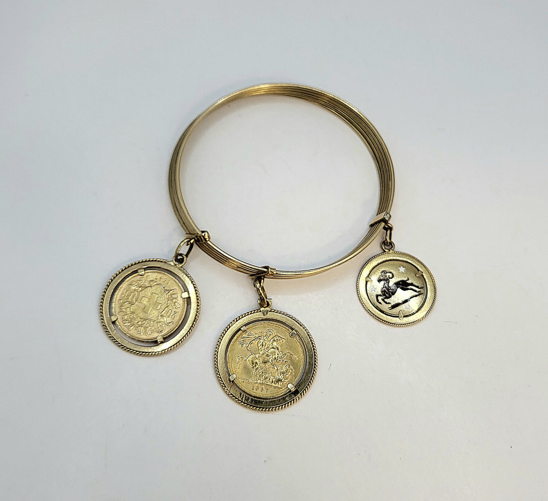 Bracciale con ciondoli oro