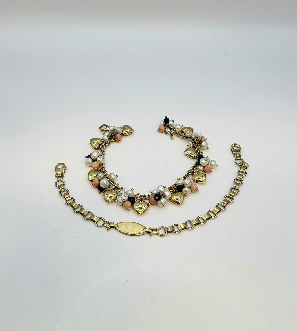 Due bracciali oro pietre perle