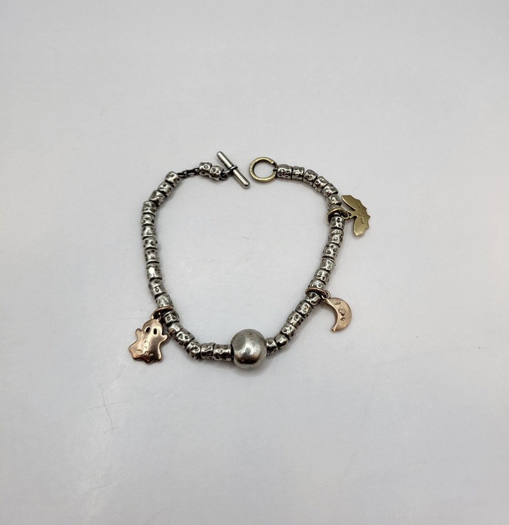 Bracciale argento con ciondoli oro a firma Dodo