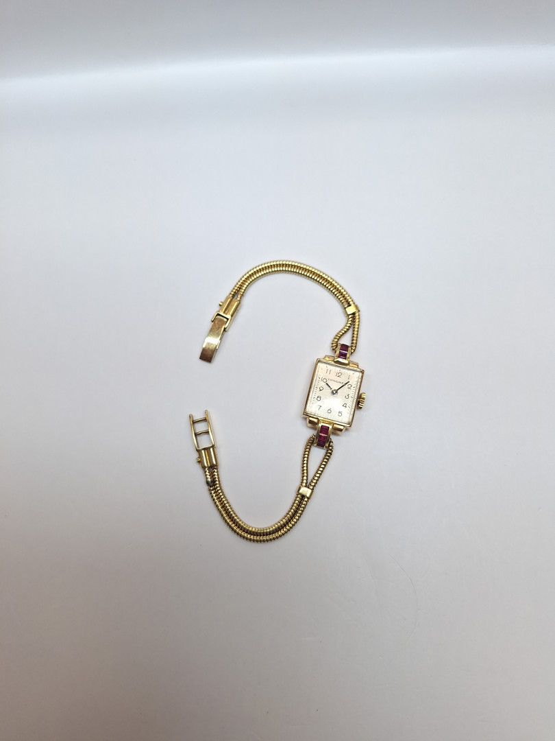 Orologio con bracciale oro pietre