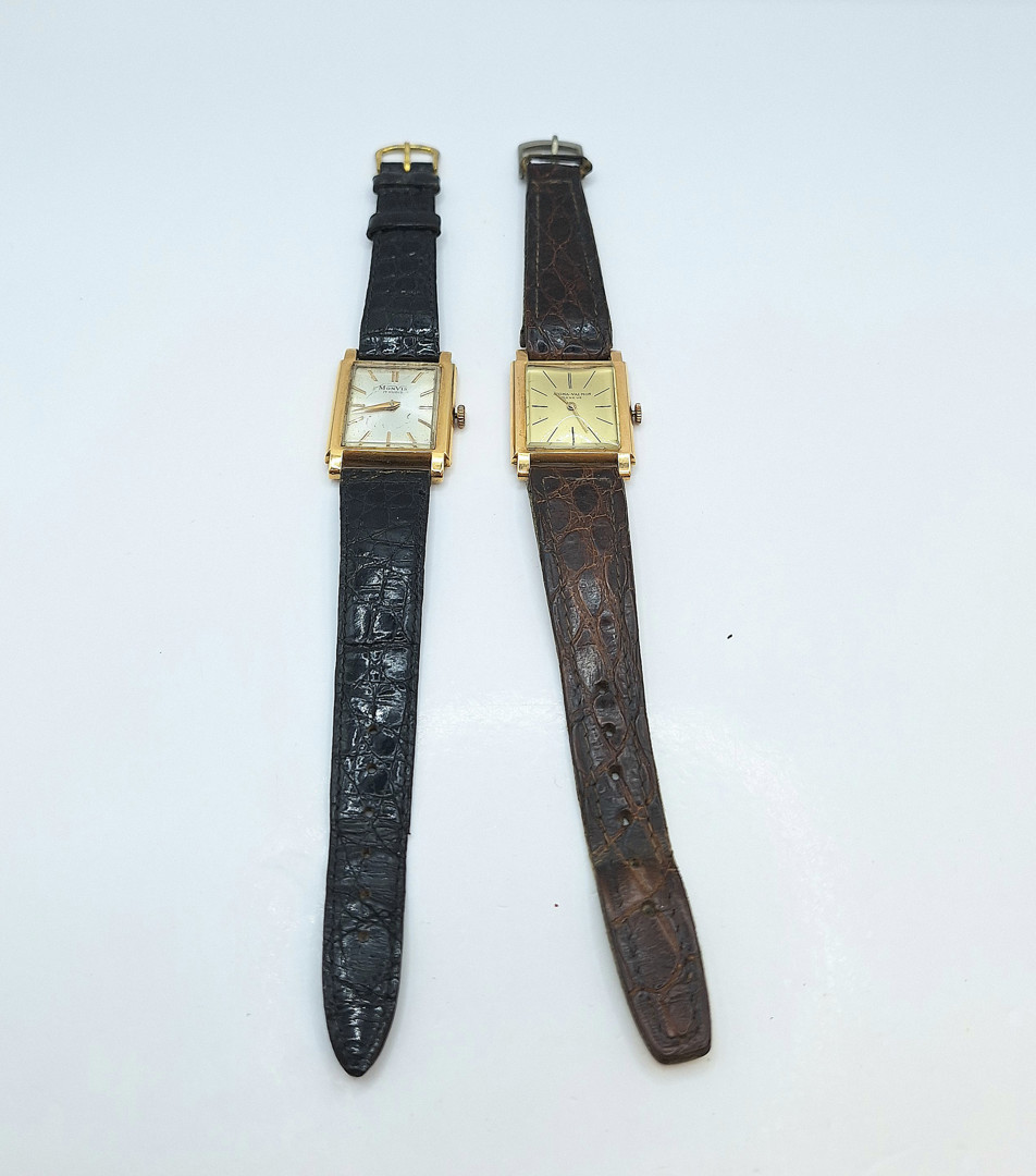Due orologi cassa oro