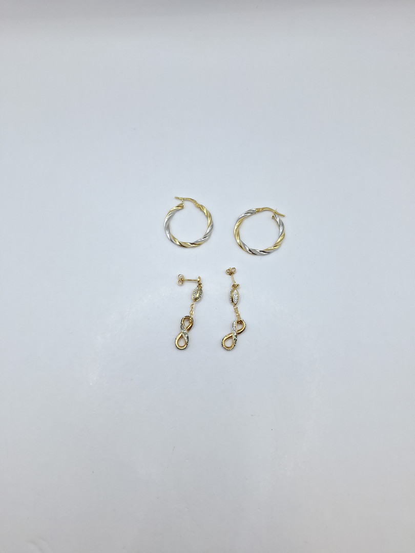 Due paia di orecchini oro pietre