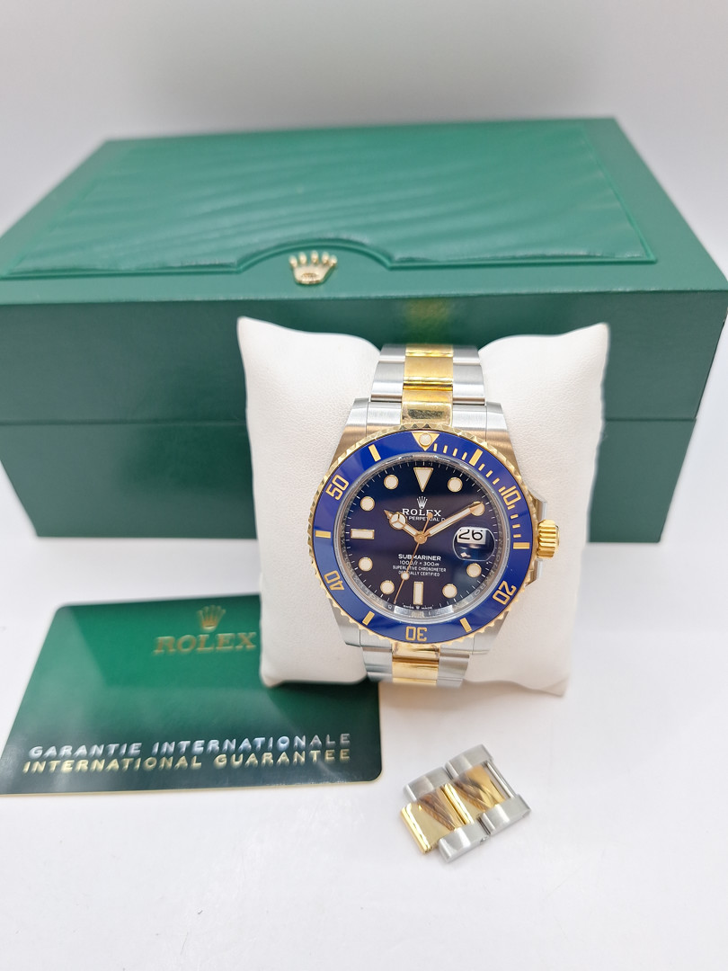 Orologio acciaio/oro Rolex Submariner scatola e garanzia a corredo 