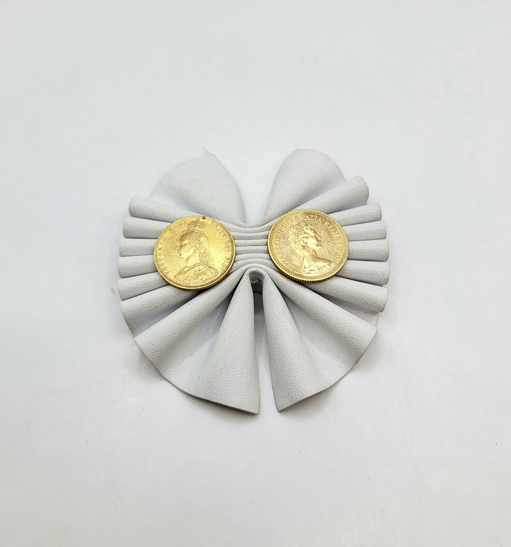 Due pezzi oro monetato