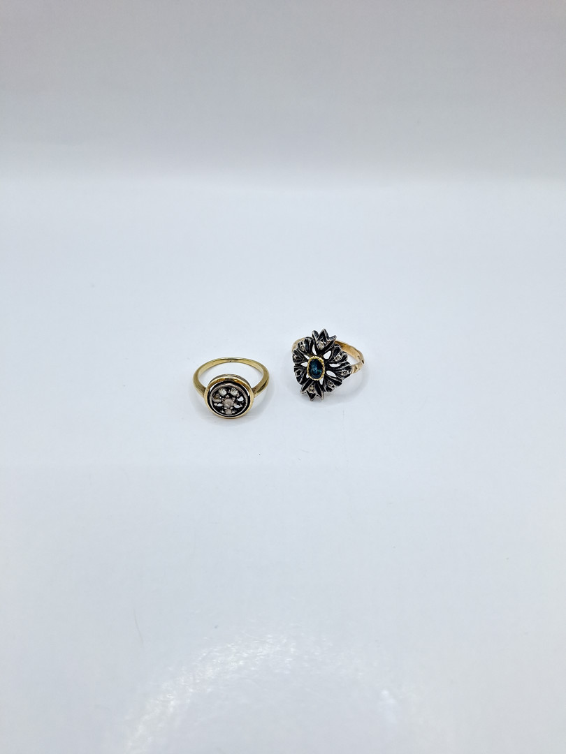 Due anelli oro argento diamanti pietra