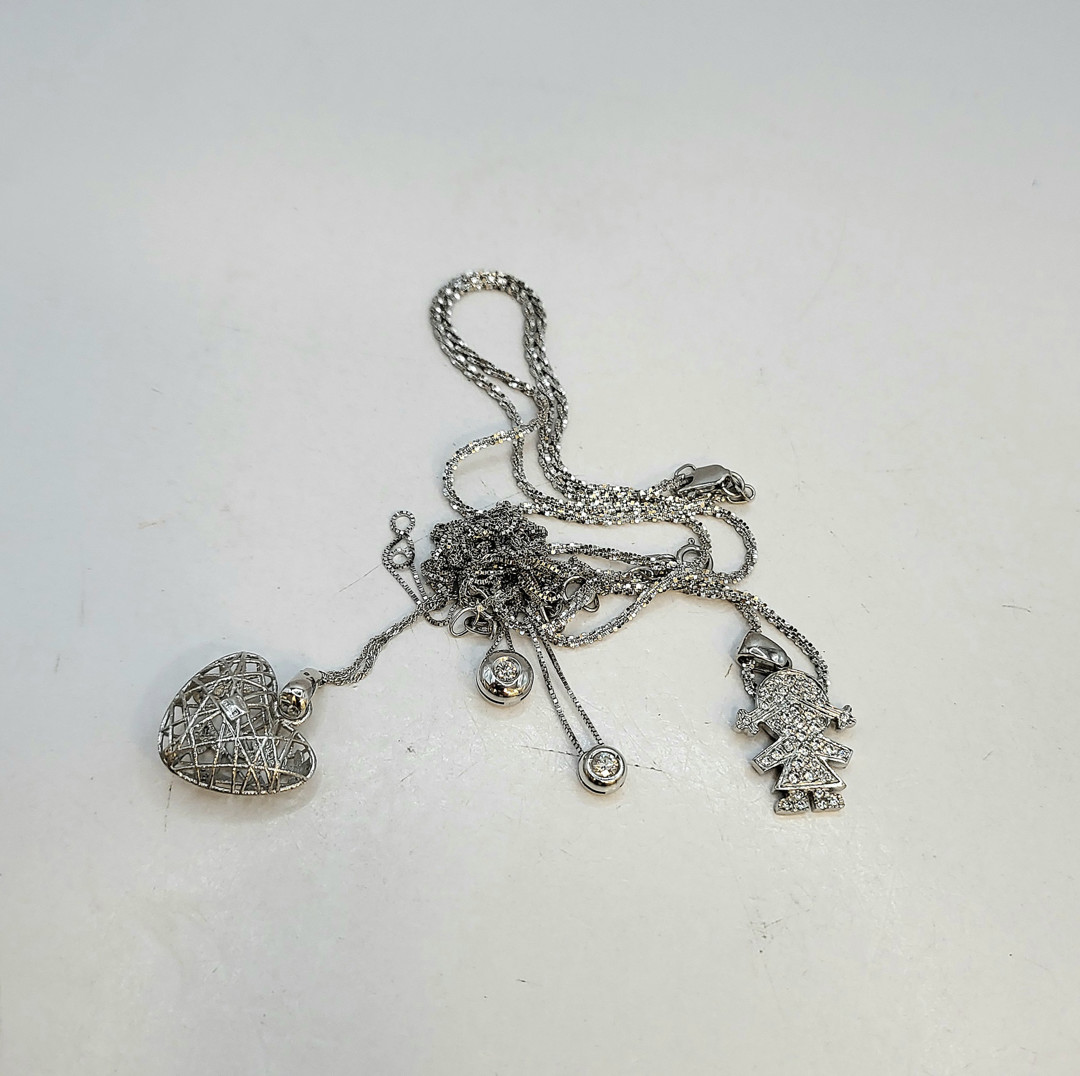 Vari oggetti oro pietre diamantini